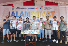 Guru di Palembang Raih Hadiah Umrah di Jalan Sehat HUT Sumeks