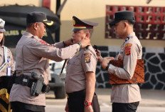 Terima Kenaikan Pangkat Setingkat Lebih Tinggi