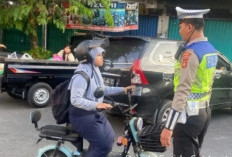 Tegur Pengguna Sepeda Listrik di Jalan Raya