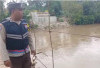 Antisipasi Banjir, Polsek Simpang Martapura Pantau Debit Air Sungai Komering