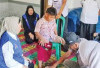Kenan Bahagia Terima Kaki Palsu dari Gubernur Sumsel Herman Deru